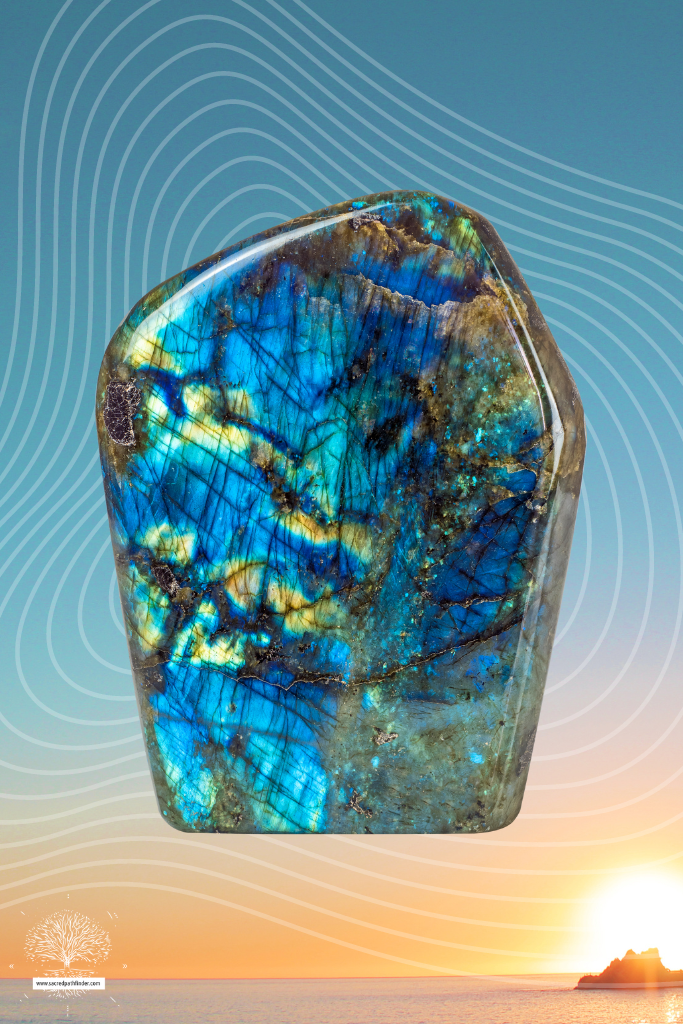 Photo of labradorite in front of a sunset background.