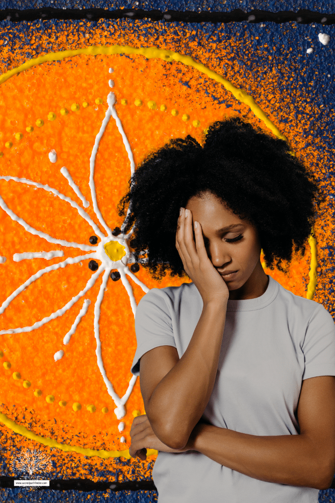 Photo of a stressed woman, in front of a chakra symbol. 