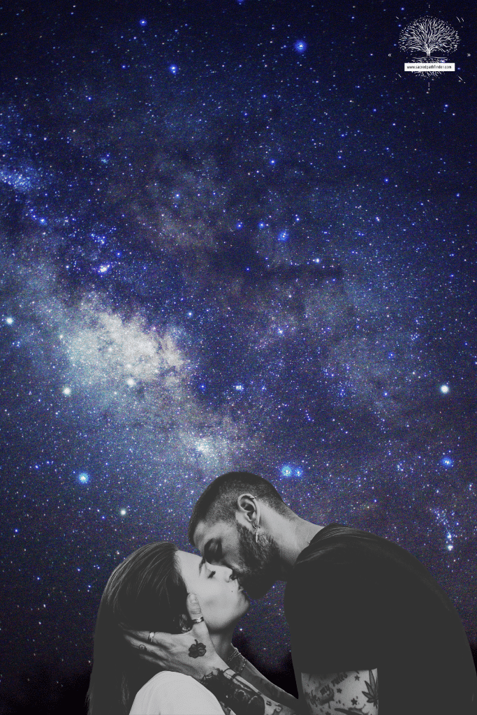 Photo of s starry night sky, with a black and white image of a man and a woman kissing in the foreground